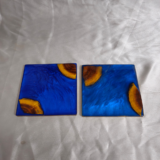 Handmade square blue resin and wood coaster with ocean-inspired design by Resineera