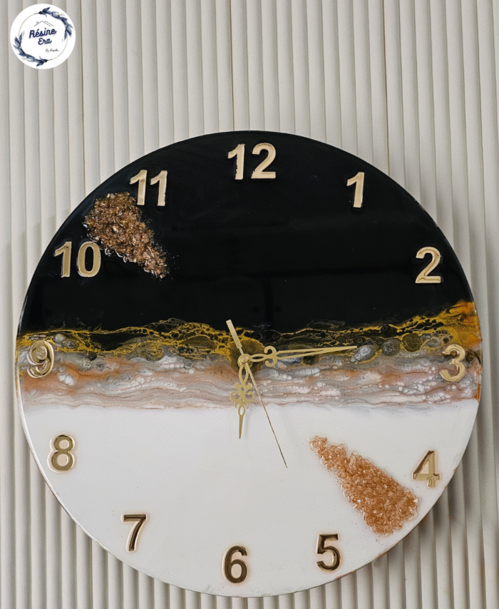 Handmade black and gold geode resin wall clock with metallic accents and quartz-like texture