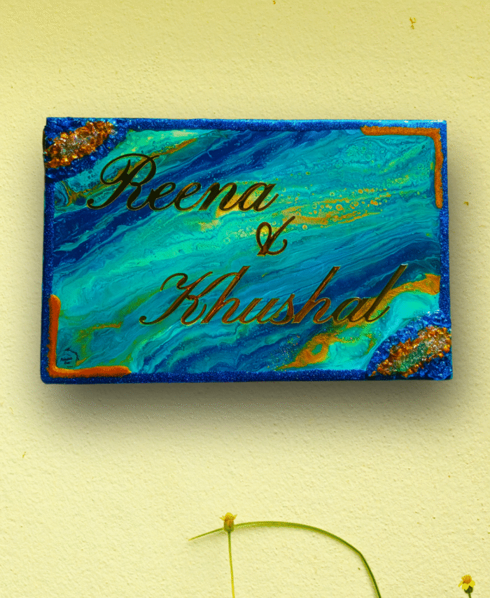 Resin wall nameplate with customized floral design