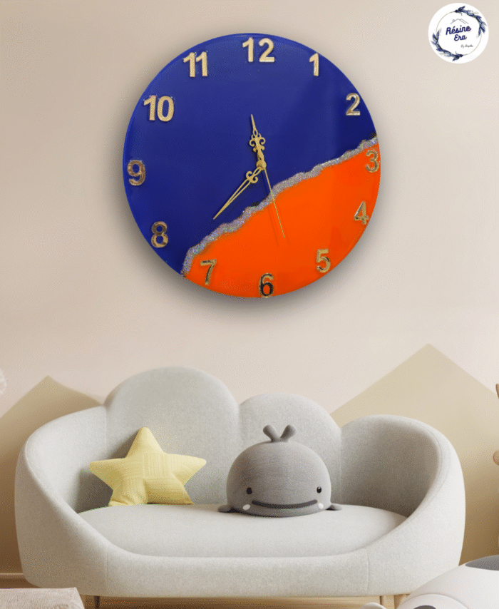 Handmade modern resin wall clock in blue and orange with golden accents