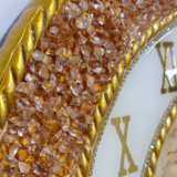 Resin wall clock with golden Roman numerals