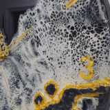 Luxury resin wall décor clock in black and gold