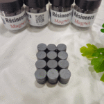 Small round ferrite magnets arranged in a set for resin art and craft use