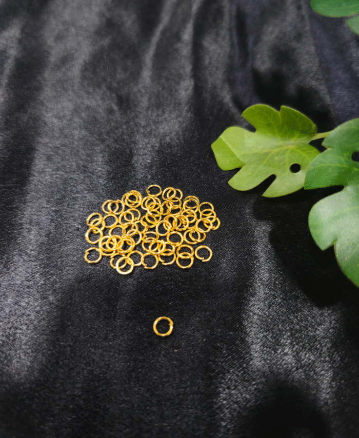 Gold Metal Jump Rings for Jewellery Making on Black Background