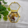 Golden hexagon glass jewelry box