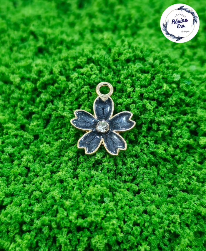 Decorative craft Flower charms for resin art and jewellery making are displayed on a soft background