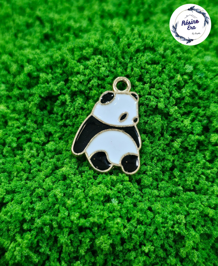 Decorative craft Panda charms for resin art and jewellery making are displayed on a soft background