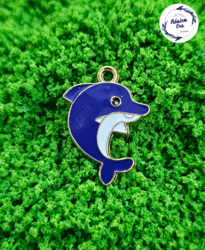 Decorative craft Dolphin charms for resin art and jewellery making are displayed on a soft background