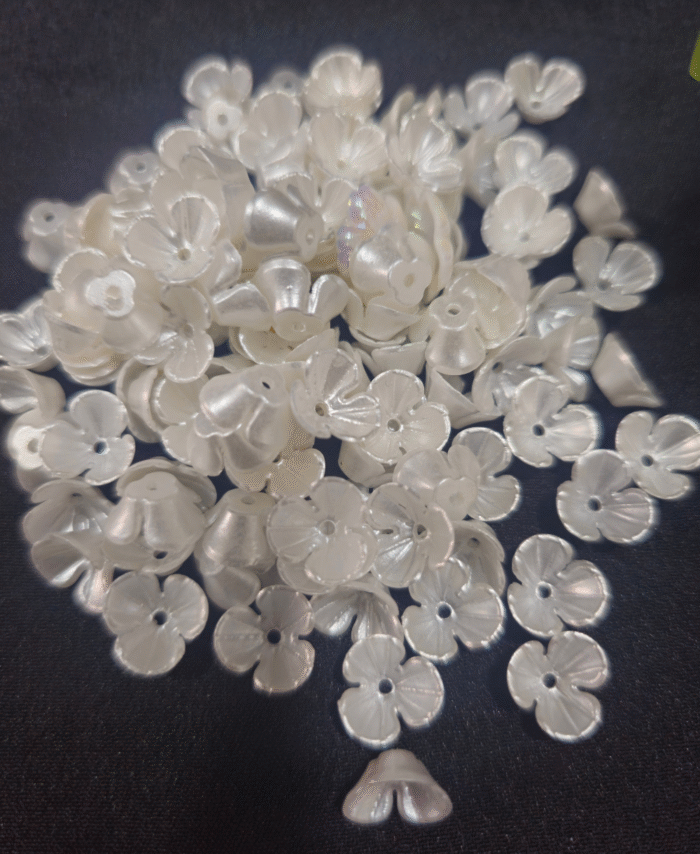 Pearl white flower beads with carved petals for jewellery and craft making