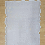 9x12 wavy-edge silicone resin tray mould on wooden surface