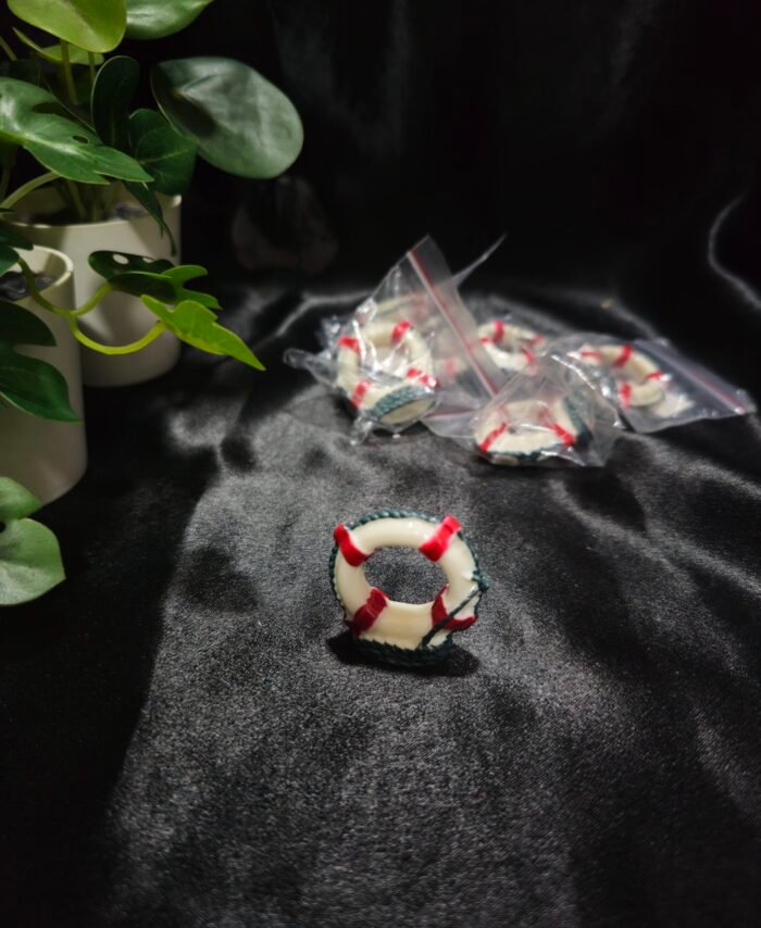 Miniature lifebuoy resin decoration with red and white detailing for craft and resin art projects