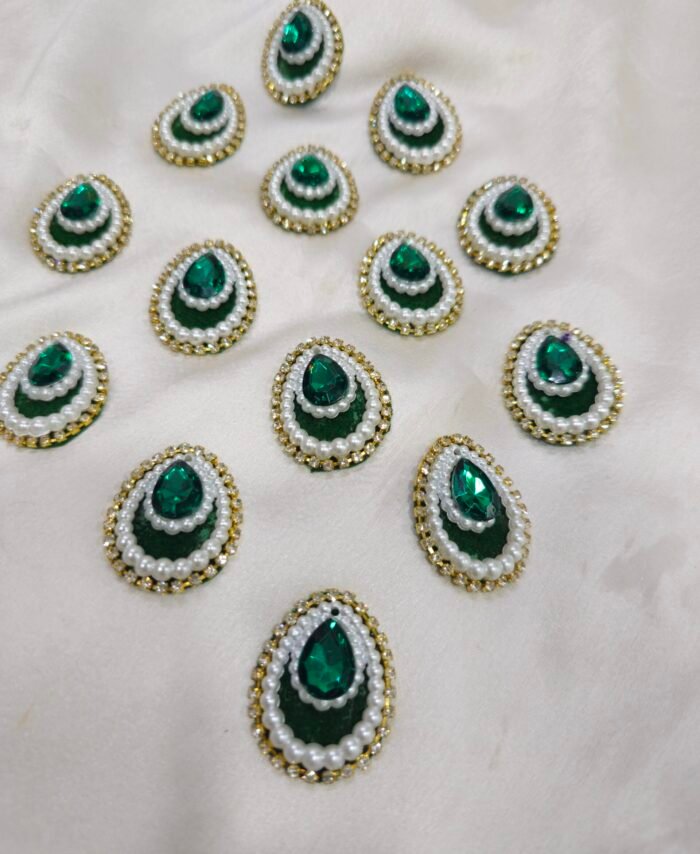 Green teardrop pearl and crystal embellishment charms with golden rhinestone border for DIY crafts and resin art.