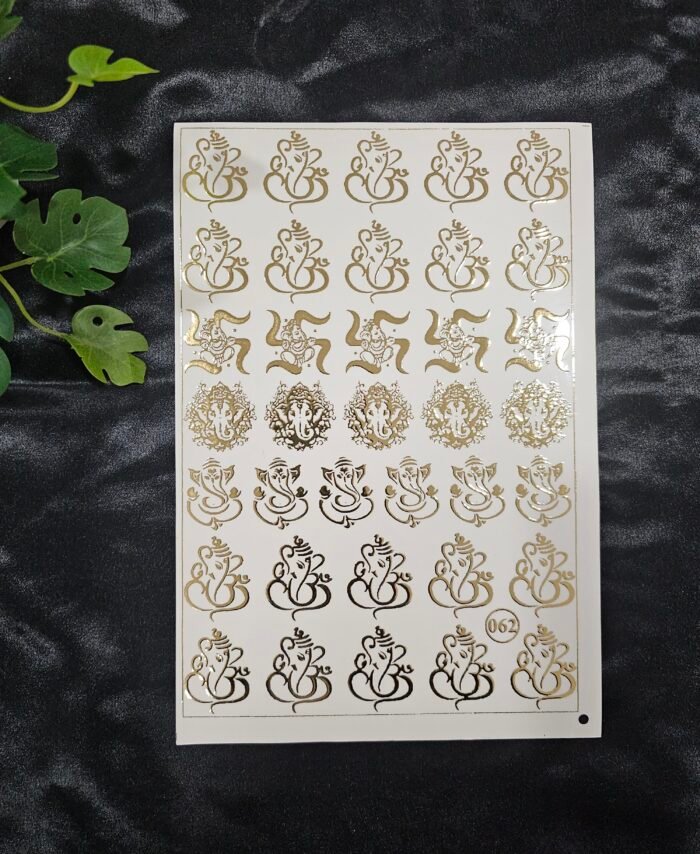 Sheet of gold embossed Ganesh stickers featuring multiple Ganpati designs arranged in rows on a white sheet.