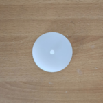 Silicone clock machine spacer mould placed on a wooden surface