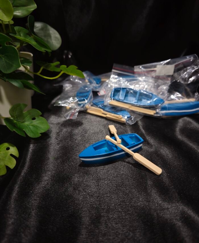 Miniature blue boat with oars used for resin art and miniature diorama decoration