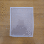 “Rectangle tiles silicone resin mould placed on a wooden surface.”