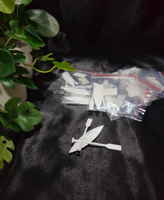 Miniature blue boat with oars used for resin art and miniature diorama decoration