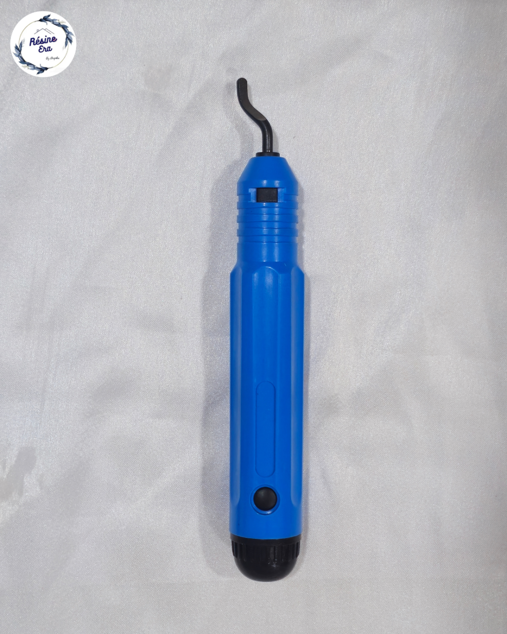 Blue handle deburring tool used for smoothing resin and acrylic edges