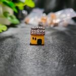 Handcrafted miniature hut with textured roof and rustic design used for resin art and miniature decoration