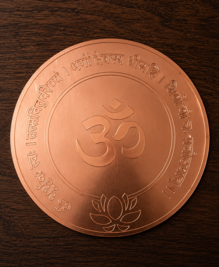 Golden acrylic Gayatri Mantra frame with Om symbol and lotus design for spiritual home décor