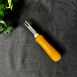 Wooden handle resin art tool with a metal fork tip used for detailed craft and resin work