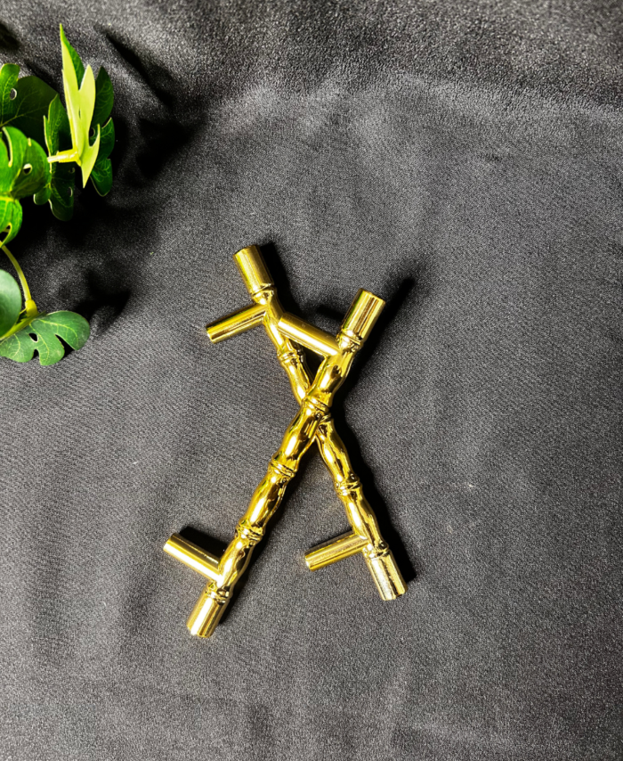 metal handles placed on a wooden base for DIY resin art and home décor projects