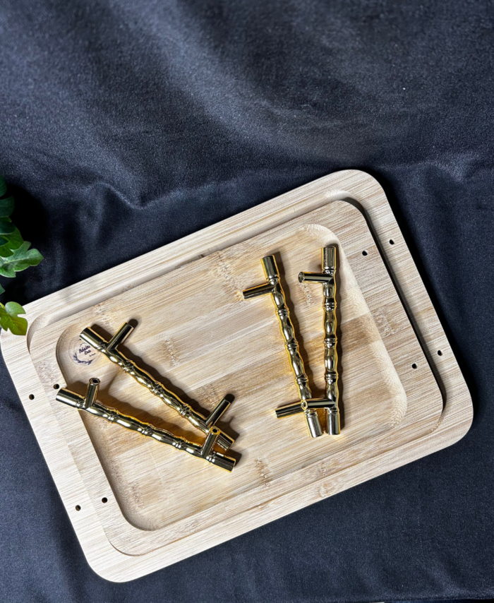 Wooden tray with metal handles and screws placed on a wooden base for DIY resin art and home décor projects