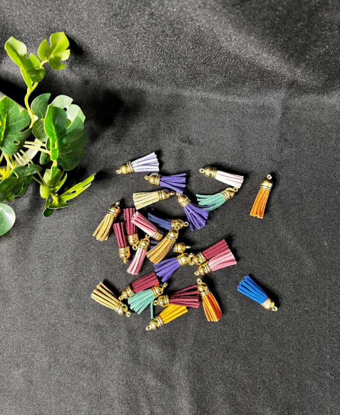 Colourful leather tassels with metal caps are used for jewellery and craft making.