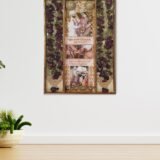 3 columns full varmala preservation frame with complete wedding garland preserved in epoxy resin, couple photos, pearls, and decorative elements in a wooden wall frame.