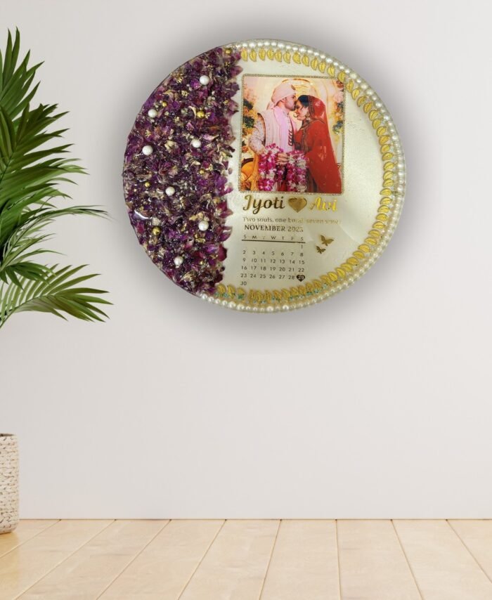 Round varmala resin frame with preserved wedding flowers, couple photo, calendar date, and pearl gold detailing