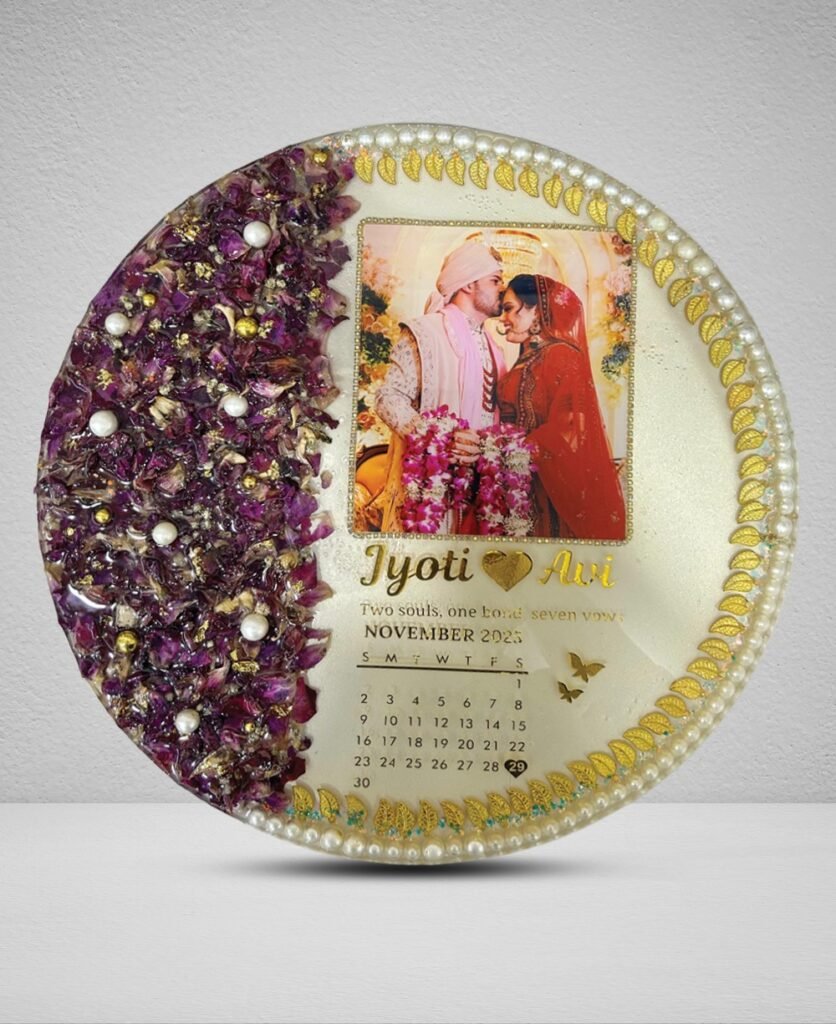 Round varmala resin frame with preserved wedding flowers, couple photo, calendar date, and pearl gold detailing