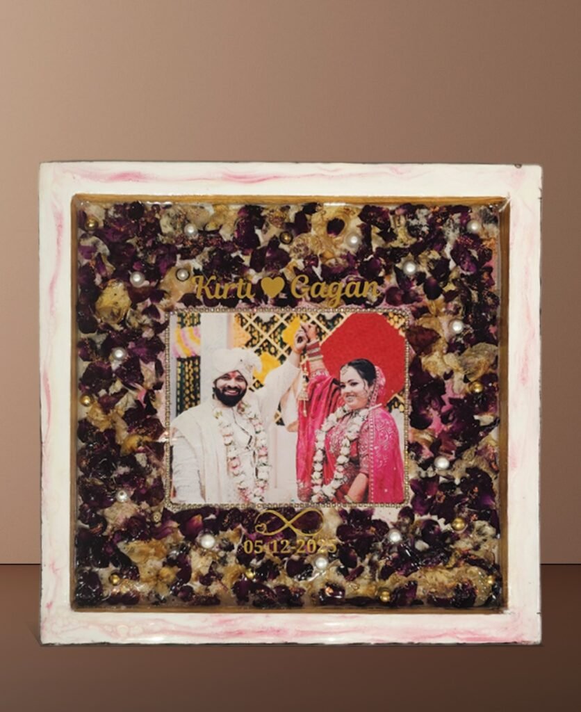 Wedding flower preservation resin frame with couple photo, preserved petals, pearl accents, and customized names and date