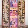 3-column full varmala preservation frame with preserved wedding garland flowers, couple photos, pearls, and decorative elements set in epoxy resin wooden wall frame.