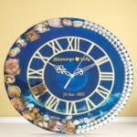 Handmade flower wall clock with real preserved flowers in clear resin and modern wall décor design