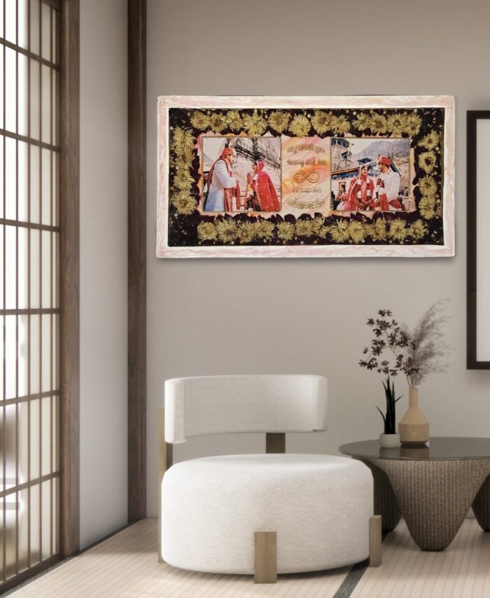 Wedding flower preservation frame with preserved flowers, couple photos, gold detailing, and personalized wedding date in resin wall frame
