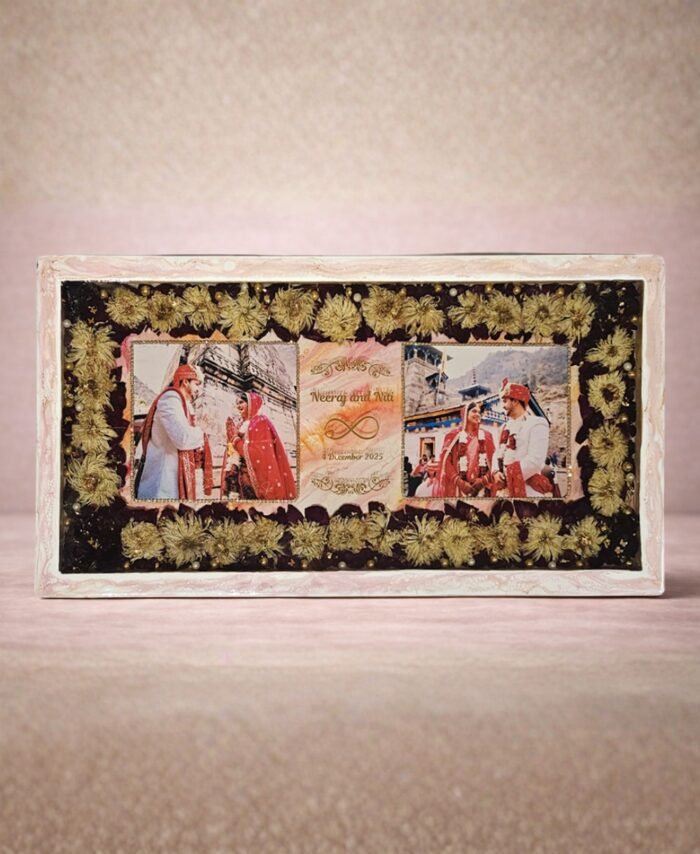 Wedding flower preservation frame with preserved flowers, couple photos, gold detailing, and personalized wedding date in resin wall frame