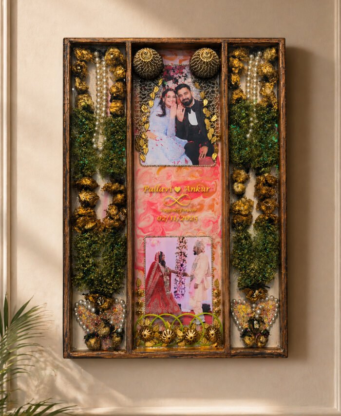 Resin varmala frame with preserved wedding flowers, pearls, and couple photos in elegant wooden frame