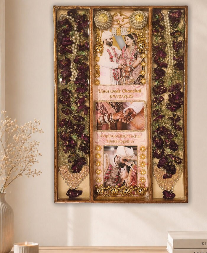 Resin varmala frame with preserved wedding flowers, pearls, and couple photos in elegant wooden frame