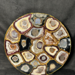 Handmade pebble table with smooth stone design and natural finish