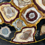 Handmade pebble table with smooth stone design and natural finish