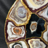 Handmade pebble table with smooth stone design and natural finish