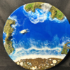 Round ocean wall art with blue resin waves, water fall and sandy beach design