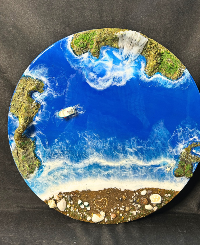Round ocean wall art with blue resin waves, water fall and sandy beach design