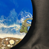 Round ocean wall art with blue resin waves, water fall and sandy beach design