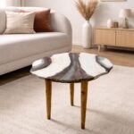 Agate marble coffee table with natural stone pattern top and wooden legs placed in a modern living room setting.