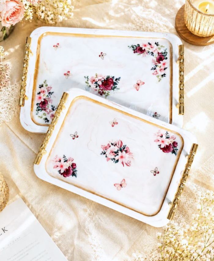 Handcrafted floral resin tray set with golden handles and glossy marble finish for serving and home décor