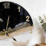 Handcrafted black and white marble resin wall clock with gold details for modern home decor