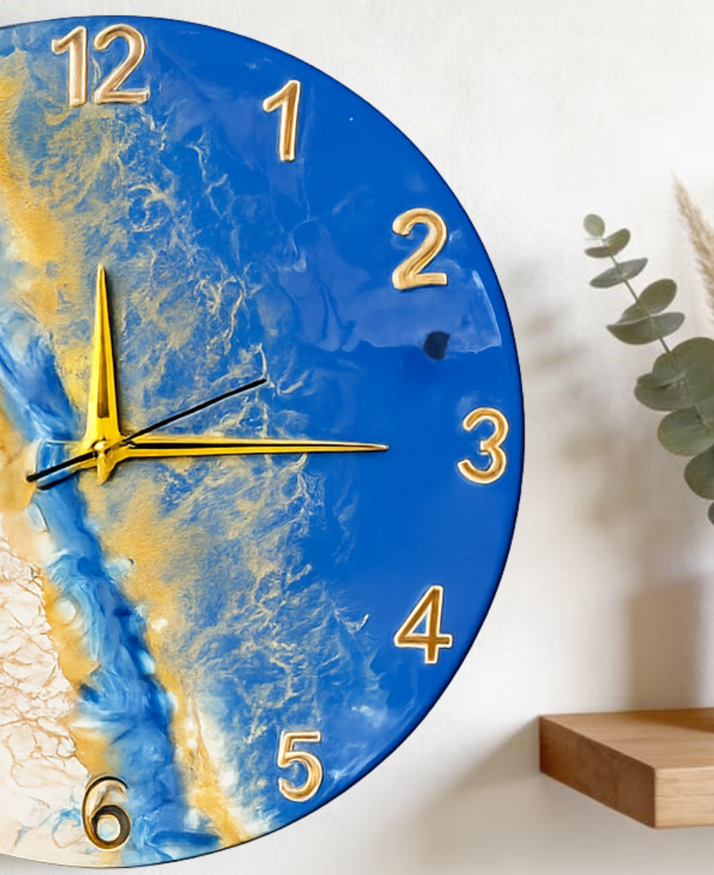 Handcrafted marble resin wall clock with ocean blue design and golden numbers for home wall decor