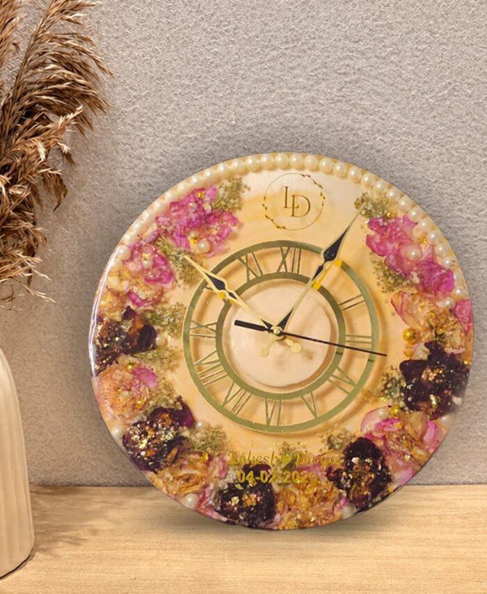 Handmade wedding flower preservation resin wall clock with real preserved varmala flowers.