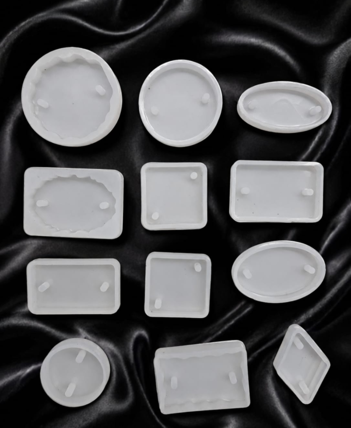 Rakhi Mould Set of 12 silicone moulds with round, oval, square, rectangle, and decorative shapes for resin art, handmade Rakhi making, and DIY craft projects.